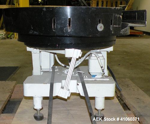 Used FMC Magnetic Parts Feeder, Model EB142. 22" diameter bowl. 60/230 Volt. Mounted on a carbon steel base.