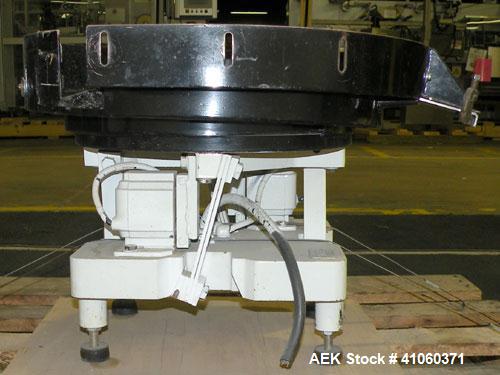Used FMC Magnetic Parts Feeder, Model EB142. 22" diameter bowl. 60/230 Volt. Mounted on a carbon steel base.