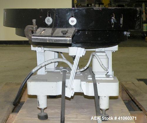 Used FMC Magnetic Parts Feeder, Model EB142. 22" diameter bowl. 60/230 Volt. Mounted on a carbon steel base.