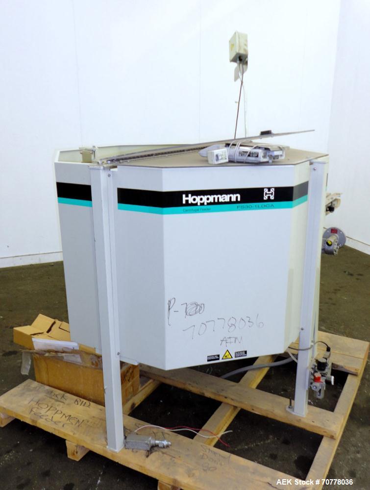 Used Hoppman 12 cuft prefeeder with Hoppman vibratory bowl feeder. Includes Hoppman FS 30 bowl feeder with scallops.