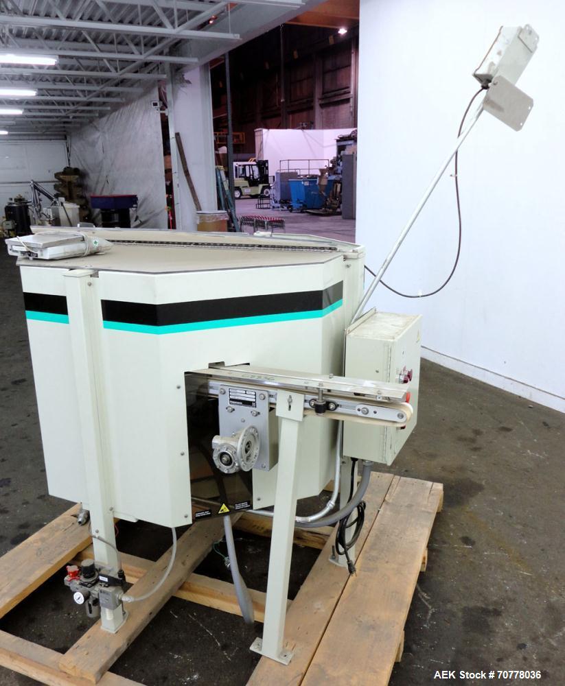 Used Hoppman 12 cuft prefeeder with Hoppman vibratory bowl feeder. Includes Hoppman FS 30 bowl feeder with scallops.