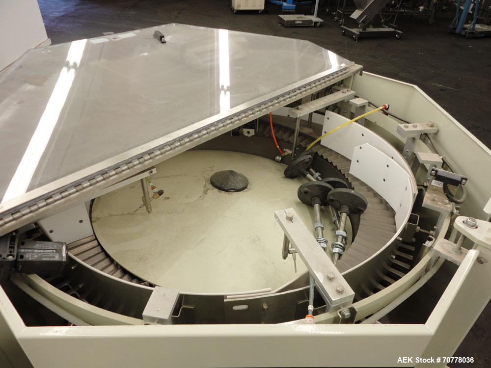 Used Hoppman 12 cuft prefeeder with Hoppman vibratory bowl feeder. Includes Hoppman FS 30 bowl feeder with scallops.