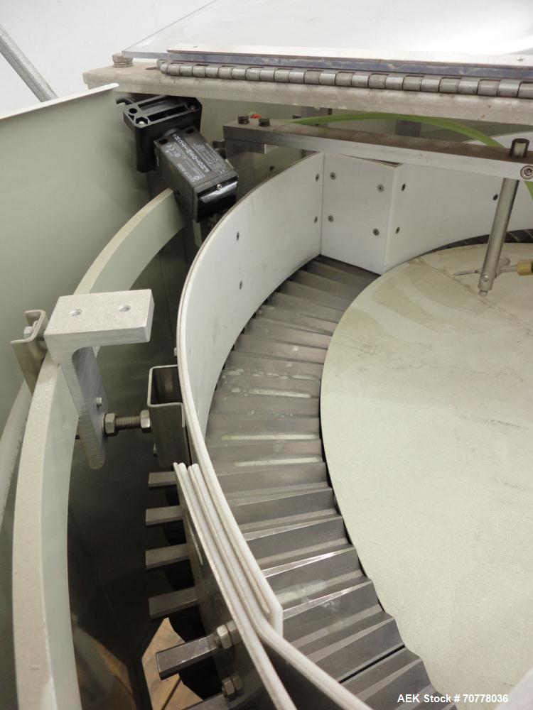 Used Hoppman 12 cuft prefeeder with Hoppman vibratory bowl feeder. Includes Hoppman FS 30 bowl feeder with scallops.