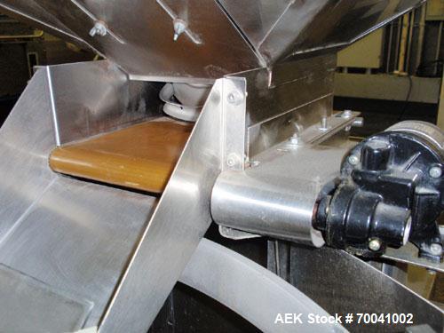Used Hoppmann Corporation Centrifugal Bowl Feeder, Model FS/25, Stainless Steel. Includes a Hoppmann live bottom prefeeder, model LB-03. Approximate rating up to 325 vials per minute. Mounted on a st...