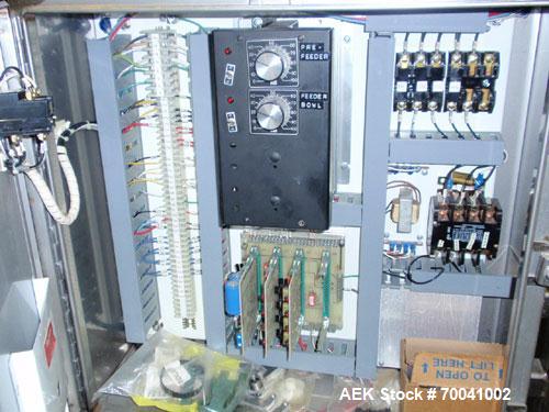 Used Hoppmann Corporation Centrifugal Bowl Feeder, Model FS/25, Stainless Steel. Includes a Hoppmann live bottom prefeeder, model LB-03. Approximate rating up to 325 vials per minute. Mounted on a st...