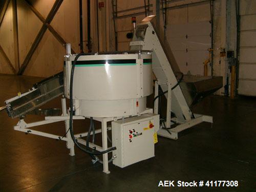 Used Hoppmann Corporation Centrifugal Bowl Feeder, Model FT40-CRS. Rated 1000 parts per minute. Includes a control panel and a Hoppmann Elevating Prefeeder, Model EP-15. Prefeeder serial# 31431.