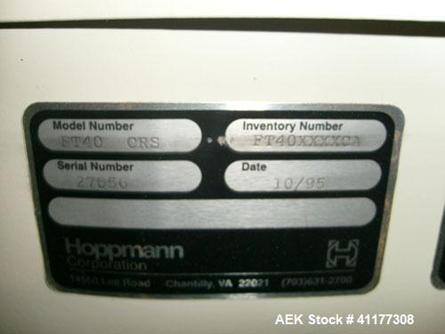 Used Hoppmann Corporation Centrifugal Bowl Feeder, Model FT40-CRS. Rated 1000 parts per minute. Includes a control panel and a Hoppmann Elevating Prefeeder, Model EP-15. Prefeeder serial# 31431.