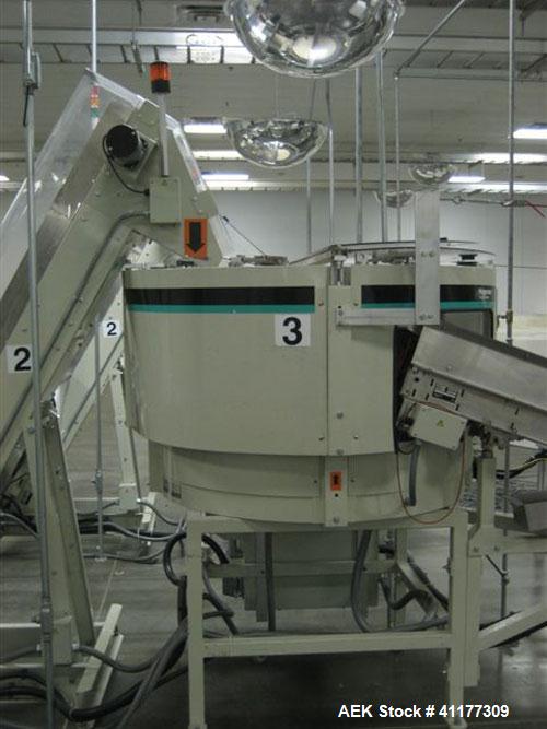 Used Hoppmann Corporation Centrifugal Bowl Feeder, Model FT40-CRS. Rated 1000 parts per minute. Includes a control panel and a Hoppmann Elevating Prefeeder, Model EP08108. Prefeeder serial# 27588.