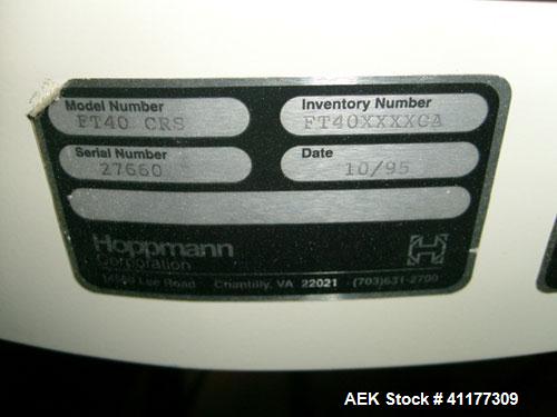 Used Hoppmann Corporation Centrifugal Bowl Feeder, Model FT40-CRS. Rated 1000 parts per minute. Includes a control panel and a Hoppmann Elevating Prefeeder, Model EP08108. Prefeeder serial# 27588.