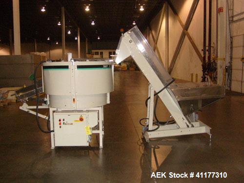 Used Hoppmann Shibuya Model FT40-CRS Corporation Centrifugal Bowl Feeder. Rated 1000 parts per minute. Includes a control panel and a Hoppmann Elevating Prefeeder, Model EP08108. Prefeeder serial# 27...