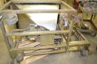 Used Hoppman 12 cuft prefeeder with Hoppman vibratory bowl feeder. Includes Hoppman FS 30 bowl feeder with scallops.