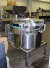 Used Hoppmann Corporation Centrifugal Bowl Feeder, Model FS/25, Stainless Steel. Includes a Hoppmann live bottom prefeeder, model LB-03. Approximate rating up to 325 vials per minute. Mounted on a st...