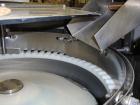 Used Hoppmann Corporation Centrifugal Bowl Feeder, Model FS/25, Stainless Steel. Includes a Hoppmann live bottom prefeeder, model LB-03. Approximate rating up to 325 vials per minute. Mounted on a st...