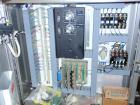 Used Hoppmann Corporation Centrifugal Bowl Feeder, Model FS/25, Stainless Steel. Includes a Hoppmann live bottom prefeeder, model LB-03. Approximate rating up to 325 vials per minute. Mounted on a st...