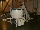Used Hoppmann Corporation Centrifugal Bowl Feeder, Model FT40-CRS. Rated 1000 parts per minute. Includes a control panel and a Hoppmann Elevating Prefeeder, Model EP-15. Prefeeder serial# 31431.