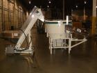 Used Hoppmann Corporation Centrifugal Bowl Feeder, Model FT40-CRS. Rated 1000 parts per minute. Includes a control panel and a Hoppmann Elevating Prefeeder, Model EP-15. Prefeeder serial# 31431.