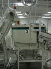 Used Hoppmann Corporation Centrifugal Bowl Feeder, Model FT40-CRS. Rated 1000 parts per minute. Includes a control panel and a Hoppmann Elevating Prefeeder, Model EP08108. Prefeeder serial# 27588.