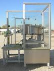 Used Vibratory Parts Feeder, 304 stainless steel. 20'' diameter x 9'' deep feed pan. Mounted on a 23'' tall table.
