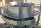 Used Vibratory Parts Feeder, 304 stainless steel. 20'' diameter x 9'' deep feed pan. Mounted on a 23'' tall table.