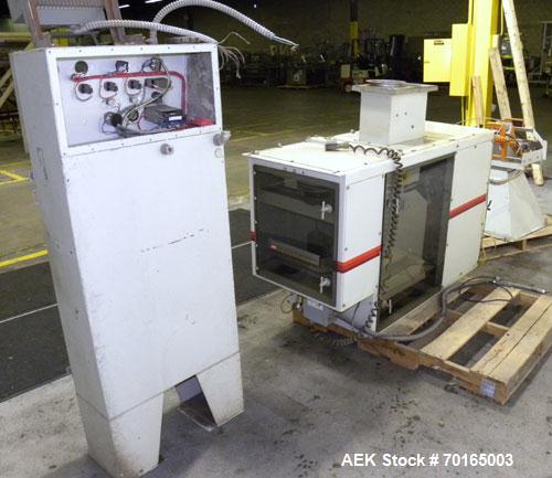 Used Bemis Bulk Bag Weigh Scale Filler, Model 6134E95, carbon steel. Includes bag clamp and panel. Approximate capacity of filling up to 50 pound bags.