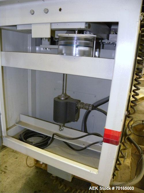 Used Bemis Bulk Bag Weigh Scale Filler, Model 6134E95, carbon steel. Includes bag clamp and panel. Approximate capacity of filling up to 50 pound bags.