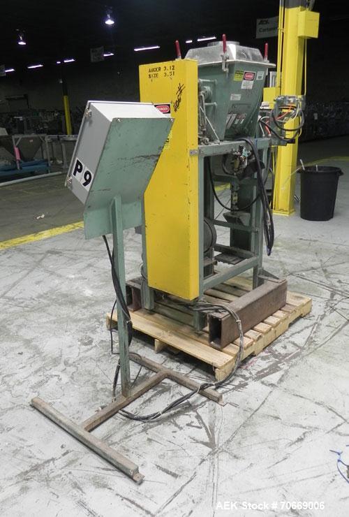 Used Chantland Model 4198-1C Weighmaster II Open Mouth Auger Bag Filler. Machine is rated at up to (5) 50 lb bags per minute. Has Flex-Weigh model HSF load cell for a weight range:  20 lbs to 110 lbs...