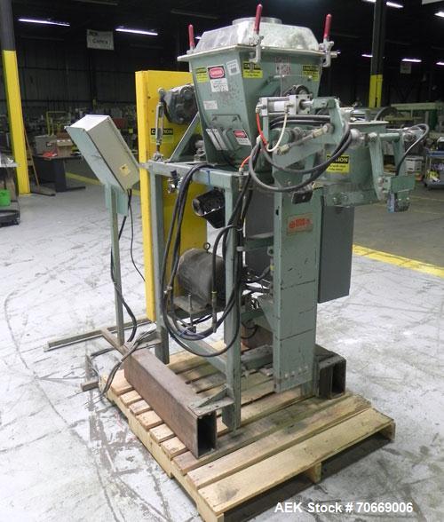 Used Chantland Model 4198-1C Weighmaster II Open Mouth Auger Bag Filler. Machine is rated at up to (5) 50 lb bags per minute. Has Flex-Weigh model HSF load cell for a weight range:  20 lbs to 110 lbs...