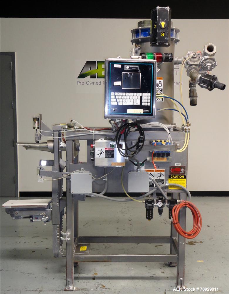 Used Chantland 4210 Air Valve Bag Packer capable of speeds up to (8) 50 lb bags per minute. Weight ranges: 25 lb to 110 lb bags. Includes bag conveyor. Has Rice Lake load cell with preset digital con...