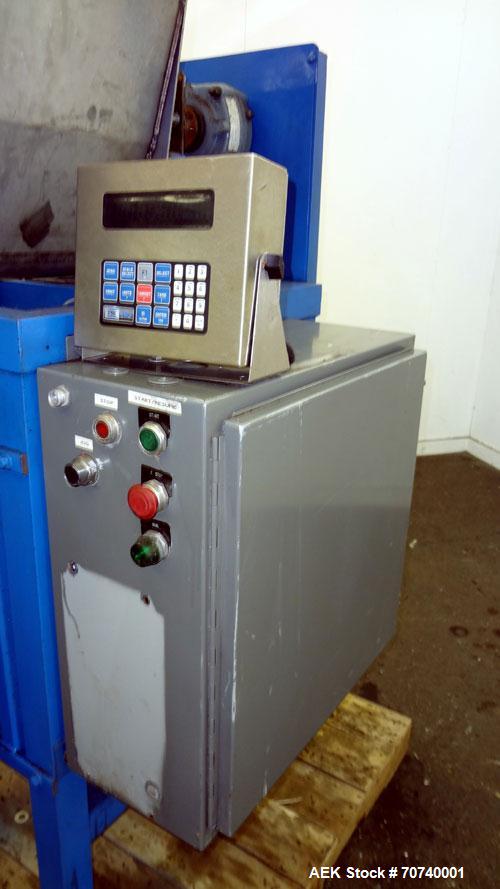 Used ECC Auger Valve Type Auger Bagger, Model 206E. 304 Stainless steel product contact parts. Production rates up to (6) 50 pound bags per minute. Weight range 20 to 110 pounds on bags, 50 to 220 po...