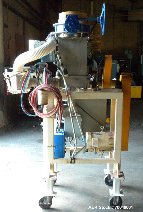 Used Robey Packaging Equipment Auger Bag Filler, Model SA 25.Designed as an auger valve bag packerwith a right angle discharge down spoutand bag clamps for open mouth bag filling.Foot pedal swithced ...
