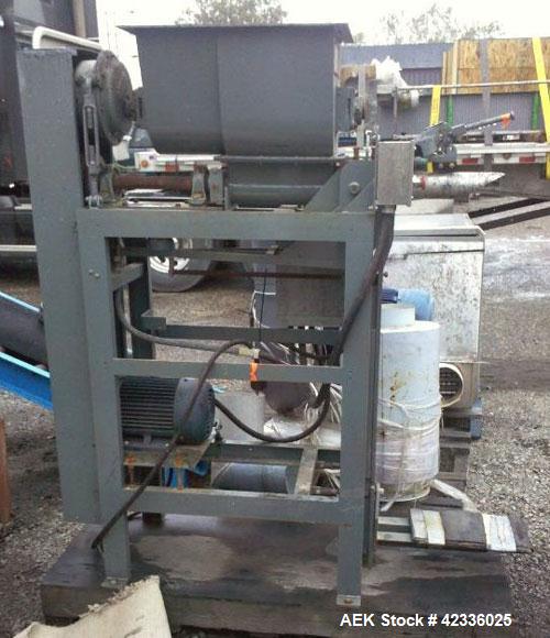 Used Stoker Auger Bag Packer, Model CR. Stainless steel spout, carbon steel auger, agitated feed hopper, 3 hp, 575 volt motor.