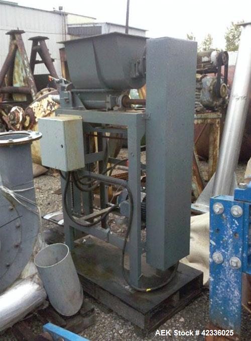 Used Stoker Auger Bag Packer, Model CR. Stainless steel spout, carbon steel auger, agitated feed hopper, 3 hp, 575 volt motor.