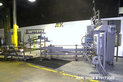 Used Taylor Products TOMP Open Mouth Bag Hanger with APO Bulk Bag Filling Line. Machine is capable of speeds up to 15 bags per minute. Can run paper or poly bags with 300 count magazine. Has a model ...