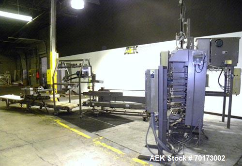 Used Taylor Products TOMP Open Mouth Bag Hanger with APO Bulk Bag Filling Line. Machine is capable of speeds up to 15 bags per minute. Can run paper or poly bags with 300 count magazine. Has a model ...