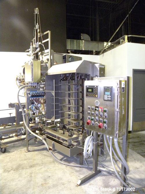Used Taylor Products TOMP Open Mouth Bag Hanger with APO Bulk Bag Filling Line. Machine is capable of speeds up to 15 bags per minute. Can run paper or poly bags with 300 count magazine. Has a model ...