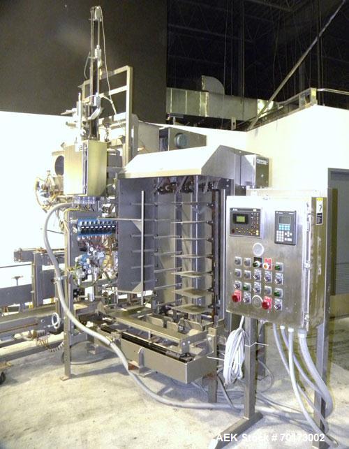 Used Taylor Products TOMP Open Mouth Bag Hanger with APO Bulk Bag Filling Line. Machine is capable of speeds up to 15 bags per minute. Can run paper or poly bags with 300 count magazine. Has a model ...