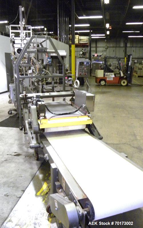 Used Taylor Products TOMP Open Mouth Bag Hanger with APO Bulk Bag Filling Line. Machine is capable of speeds up to 15 bags per minute. Can run paper or poly bags with 300 count magazine. Has a model ...