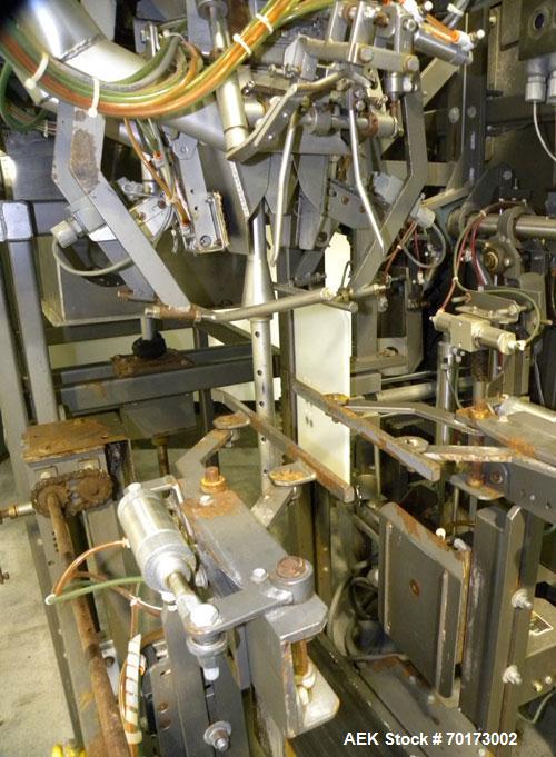 Used Taylor Products TOMP Open Mouth Bag Hanger with APO Bulk Bag Filling Line. Machine is capable of speeds up to 15 bags per minute. Can run paper or poly bags with 300 count magazine. Has a model ...