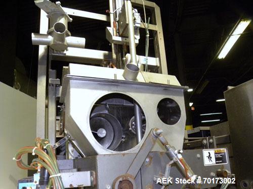 Used Taylor Products TOMP Open Mouth Bag Hanger with APO Bulk Bag Filling Line. Machine is capable of speeds up to 15 bags per minute. Can run paper or poly bags with 300 count magazine. Has a model ...