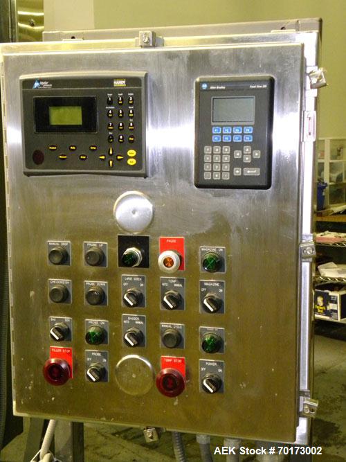 Used Taylor Products TOMP Open Mouth Bag Hanger with APO Bulk Bag Filling Line. Machine is capable of speeds up to 15 bags per minute. Can run paper or poly bags with 300 count magazine. Has a model ...