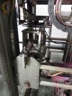 Used- Bemis Model 7115E168 Bag Filler with Model 6162A2 Duplex Net Weigh Scale & automated Bemis bag placer with blank bag m...