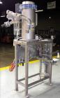 Used Chantland 4210 Air Valve Bag Packer capable of speeds up to (8) 50 lb bags per minute. Weight ranges: 25 lb to 110 lb bags. Includes bag conveyor. Has Rice Lake load cell with preset digital con...