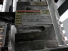 Used Chantland 4210 Air Valve Bag Packer capable of speeds up to (8) 50 lb bags per minute. Weight ranges: 25 lb to 110 lb bags. Includes bag conveyor. Has Rice Lake load cell with preset digital con...