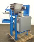Used ECC Auger Valve Type Auger Bagger, Model 206E. 304 Stainless steel product contact parts. Production rates up to (6) 50 pound bags per minute. Weight range 20 to 110 pounds on bags, 50 to 220 po...