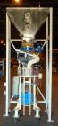 Used Robey Packaging Equipment Auger Bag Filler, Model SA 25.Designed as an auger valve bag packerwith a right angle discharge down spoutand bag clamps for open mouth bag filling.Foot pedal swithced ...