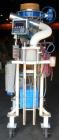 Used Robey Packaging Equipment Auger Bag Filler, Model SA 25.Designed as an auger valve bag packerwith a right angle discharge down spoutand bag clamps for open mouth bag filling.Foot pedal swithced ...