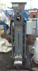 Used Stoker Auger Bag Packer, Model CR. Stainless steel spout, carbon steel auger, agitated feed hopper, 3 hp, 575 volt motor.