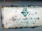 Used Stoker Auger Bag Packer, Model CR. Stainless steel spout, carbon steel auger, agitated feed hopper, 3 hp, 575 volt motor.