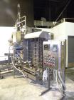 Used Taylor Products TOMP Open Mouth Bag Hanger with APO Bulk Bag Filling Line. Machine is capable of speeds up to 15 bags per minute. Can run paper or poly bags with 300 count magazine. Has a model ...