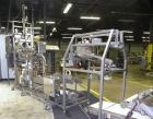 Used Taylor Products TOMP Open Mouth Bag Hanger with APO Bulk Bag Filling Line. Machine is capable of speeds up to 15 bags per minute. Can run paper or poly bags with 300 count magazine. Has a model ...